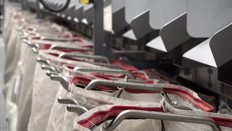 Automated parcel sorting system filling bags Stock Footage 83598047