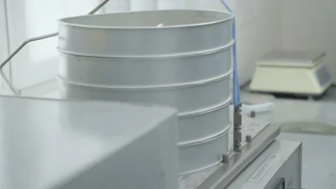 Automated Plant Machine Processing Grain Chicken Food By Shaking Barrel Stock Footage 220675055