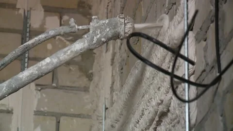 Automated plastering of walls. spray solution closeup Stock Footage 146531521