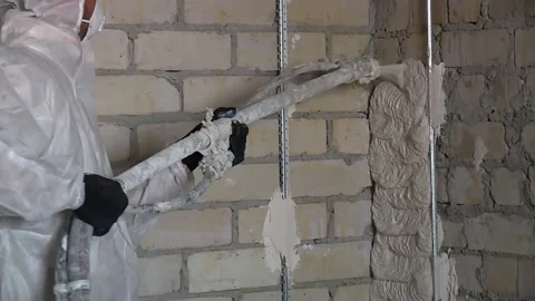 Automated plastering of walls. spray solution closeup Stock Footage 146531525