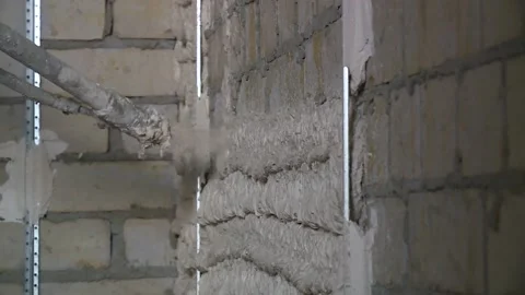 Automated plastering of walls. spray solution closeup Stock Footage 146531529