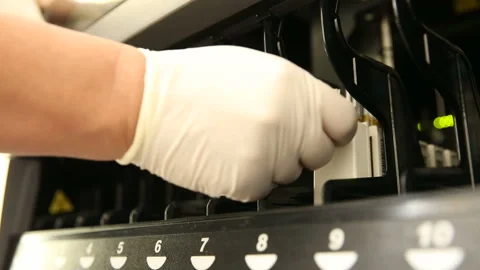 Automated process of biological samples research in biochemistry analyzer.  Stock Footage 168632858