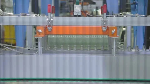 Automated Production Line Conveying Empty Bottles in Beverage Factory Stock Footage 336712729