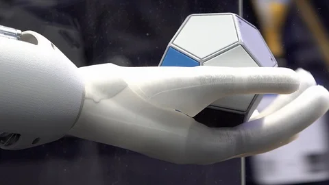 Automated roboter hand playing with cube Stock Footage 105949908