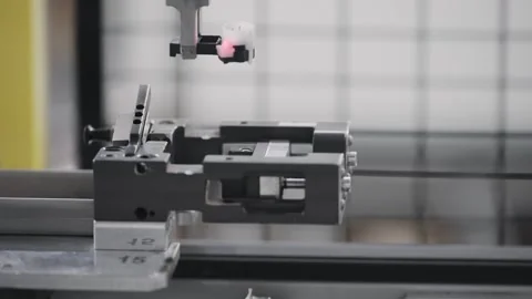 Automated robotic arm equipment assembling components in electronic manufactu 스톡 동영상 331248062