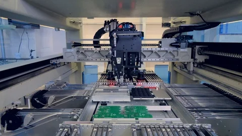 Automated robotic electronics parts manufacturing machine. 4K. Stock Footage