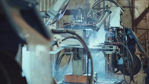 Automated robotic welding machine joining metal Stock Photos