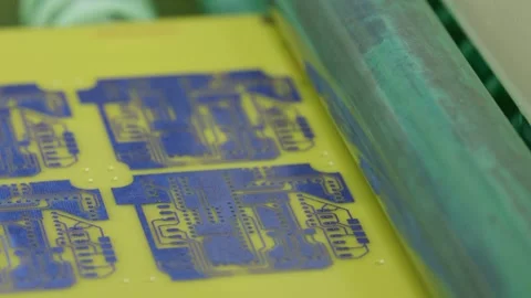 Automated roller applying solder paste to circuit boards Stock Footage 316542283