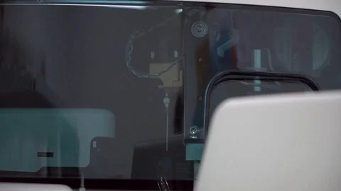 Automated sample taking machine operation. Close-up view. Stock Footage 119768147