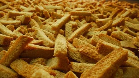 Automated snack packaging system sorting crispy snack sticks Stock Photos