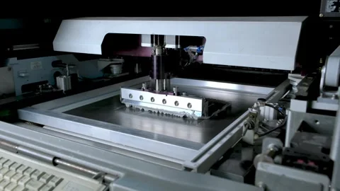 Automated solder paste printing machine in PCB assembly production line Stock Footage 325433396