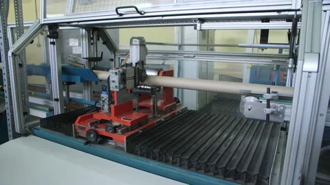 The Automated System Cuts Paper Tubes With A Knife. Production Of Chemicals. Stock Footage 197334735
