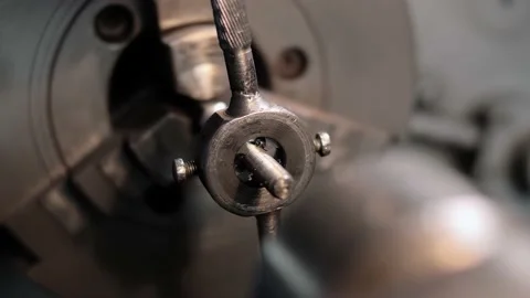 Automated threading of a bolt with a lathe. Stock Footage 212404523