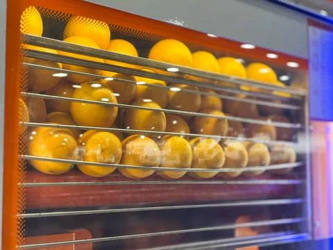 Automated vending machine specifically designed to squeeze fresh orange juice Stock Photos