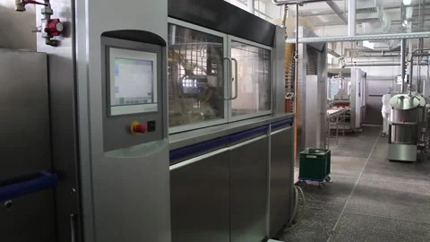 An automated waffle making machine located in a confectionery factory. Video stock 122336164