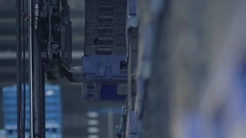 Automated Warehouse Robot Moving Blue Storage Bins, Close Up Shot Stock Footage 342285322