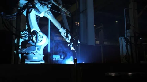 An automated welding machine is working in the factory shop Stock Footage 163335013
