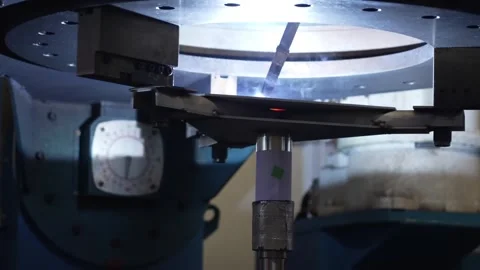 Automated welding station with rotary table and robotic arm performing Stock Footage 334964959