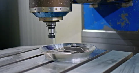 Automated work of modern CNC milling machine, closeup, industrial equipment in Stock Footage 230700978