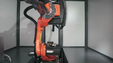 Automated work with robotic hands in the modern industrial iron and aluminum Stock Footage 334587233