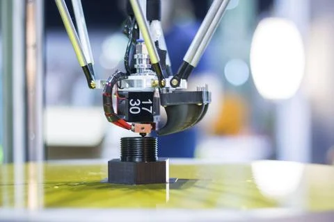 Automatic 3d printer performs a three-dimensional product creation, close-up Illustrazione stock
