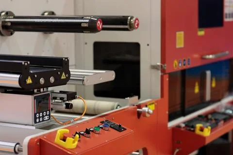 Automatic adhesive label laser cutting machine Stock Photos