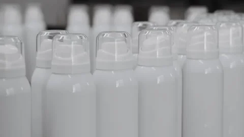 Automatic aerosol spray production line. Stock Footage 306576473