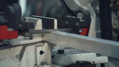 Automatic band saw cutting tool steel Stock Footage 98707576