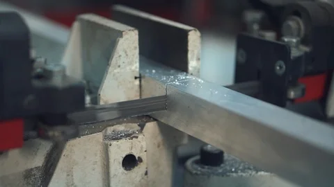Automatic band saw cutting tool steel Stock Footage 98707688