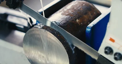 The automatic band saw machine cutting the metal rod. The machine tool operation Stock Footage 167555383