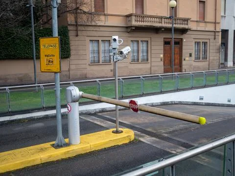 Automatic barrier gate controlling vehicle access to the underground parkin.. 스톡 사진