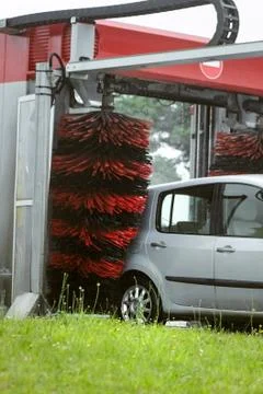 Automatic Brush Car Wash. The process of washing the automobile Stock Photos