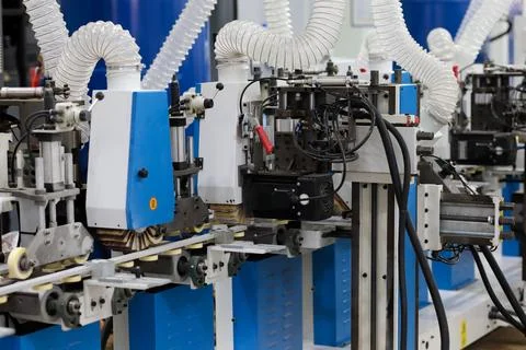 Automatic brush sanding machine for polishing wood Stock Photos