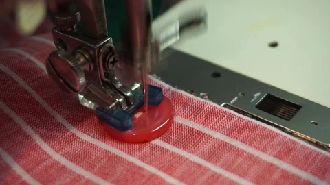 Automatic button attachment with using sewing machine Stock Footage 196977565