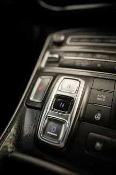 Automatic button gear shifter in a new car Stock Photos