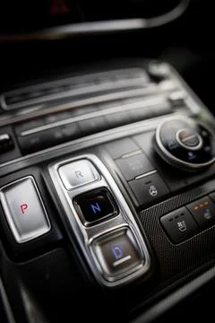 Automatic button gear shifter in a new car Stock Photos