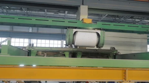 Automatic cable transporter moves along green rail support Stock Footage 124608285