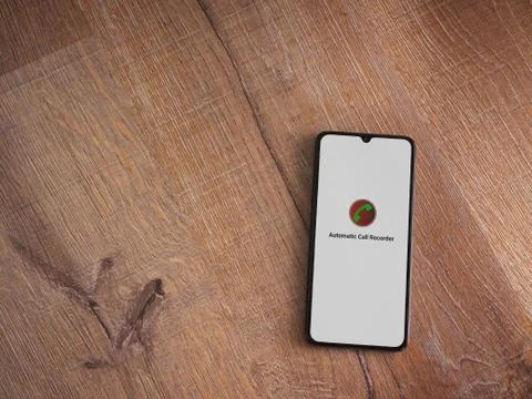 Automatic Call Recorder app launch screen with logo on the display of a black Stock Photos