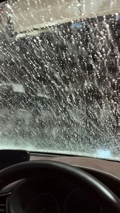 Automatic Car Wash Brushes Cleaning Windshield Viewed from Inside Vehicle Stock Footage 340679897