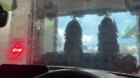Automatic Car Wash Brushes Cleaning Windshield Viewed from Inside Vehicle Stock Footage 340680947