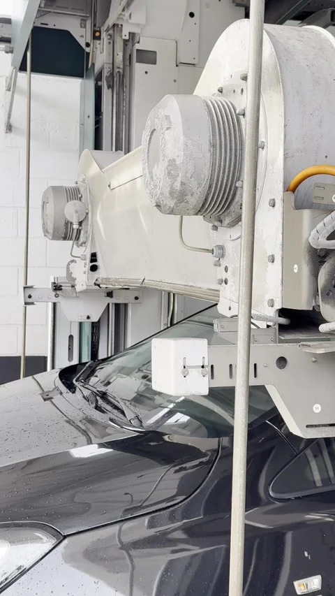 Automatic car wash drying a black vehicle Stock Footage 306081943