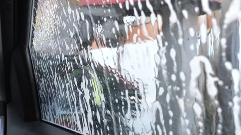 Automatic car wash in process Stock Footage 127917671