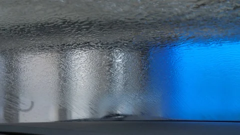 Automatic car wash in process Stock Footage 127917880