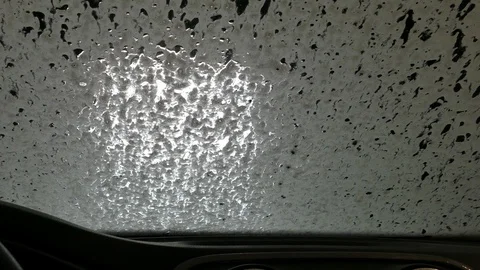 Automatic car wash seen from inside of a vehicle Stock Footage 96195316