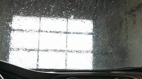 Automatic car wash seen from inside of a vehicle Stock Footage 96196009