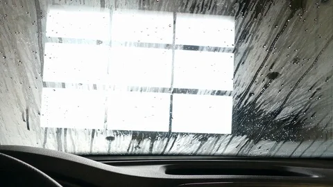 Automatic car wash seen from inside of a vehicle Stock Footage 96196158