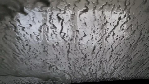 Automatic car wash station in operation - inside car view Stock Footage 310900785