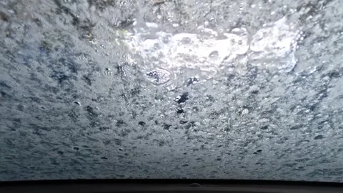 Automatic car wash, view from inside the car interior Stock Footage 263985295