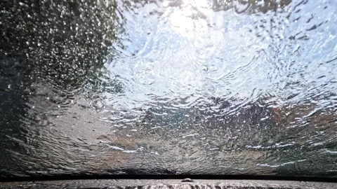 Automatic car wash, view from inside the car interior Video stock 266952930