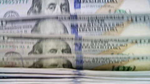 Automatic cash counting machine counting 100 dollar bills. Visual concept of Stock Footage 340025494